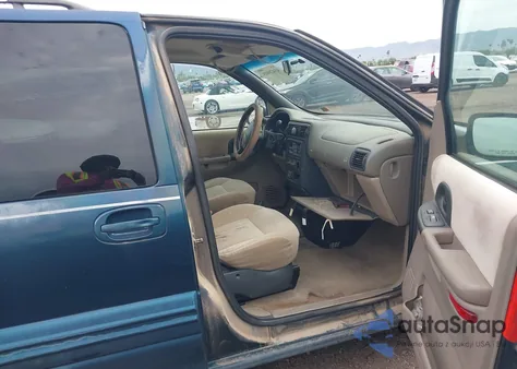 1999 Pontiac Montana z USA, uszkodzony, nr VIN 1GMDU03E5XD218351